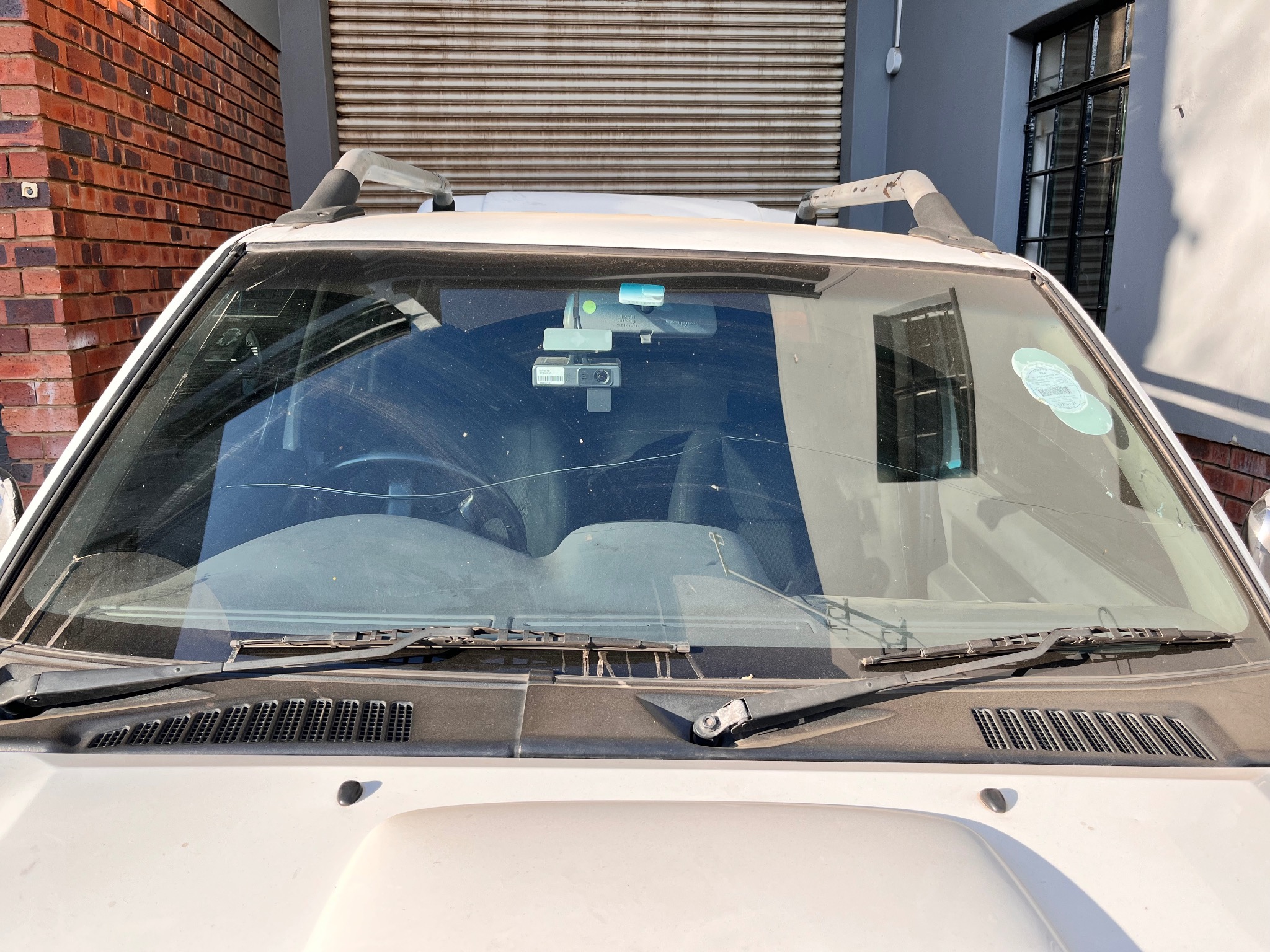 Before: damaged windscreen before replacement